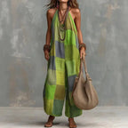 Jumpsuit Tatting Lace Collection Exclusive Edition: green patchwork halter jumpsuit, layered necklaces, and a woven bag